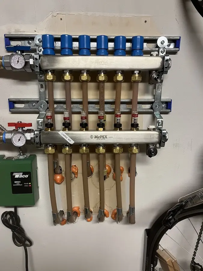 Plumber performing Water Heater Repair at a residential property in Clyde Hill